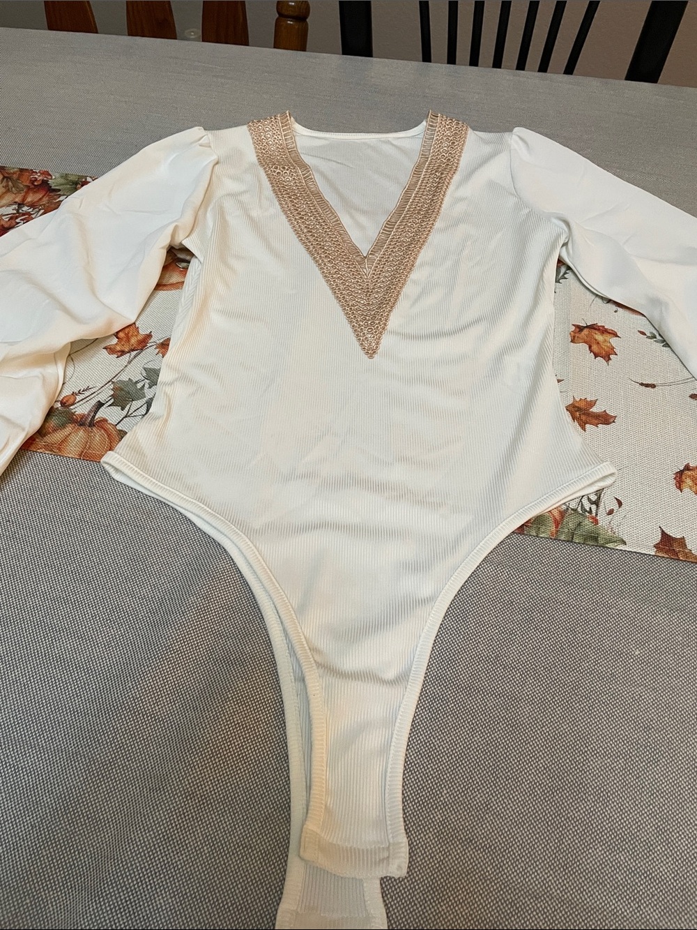 Cream Long Sleeve V‑Neck One‑Piece Bodysuit, S